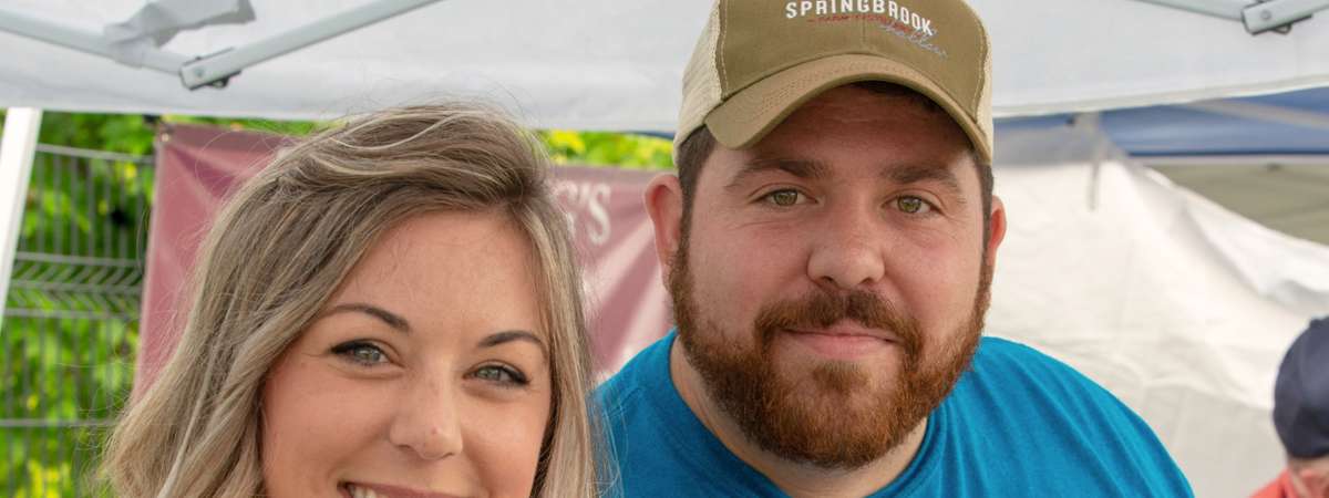 two vendors at the adirondack wine and food festival