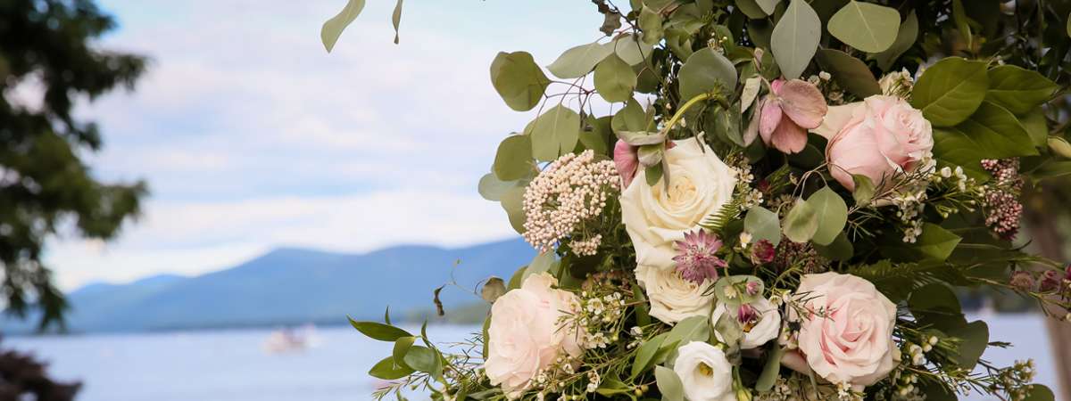 Rose Arch in front of Lake George and the Adirondack Mountains in the background