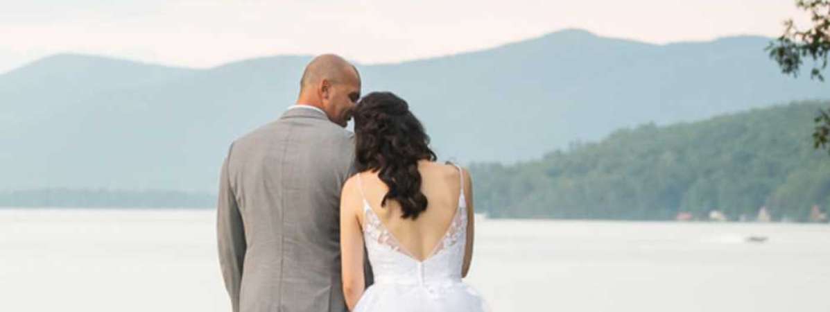 View of bridal couple in front of Lake George