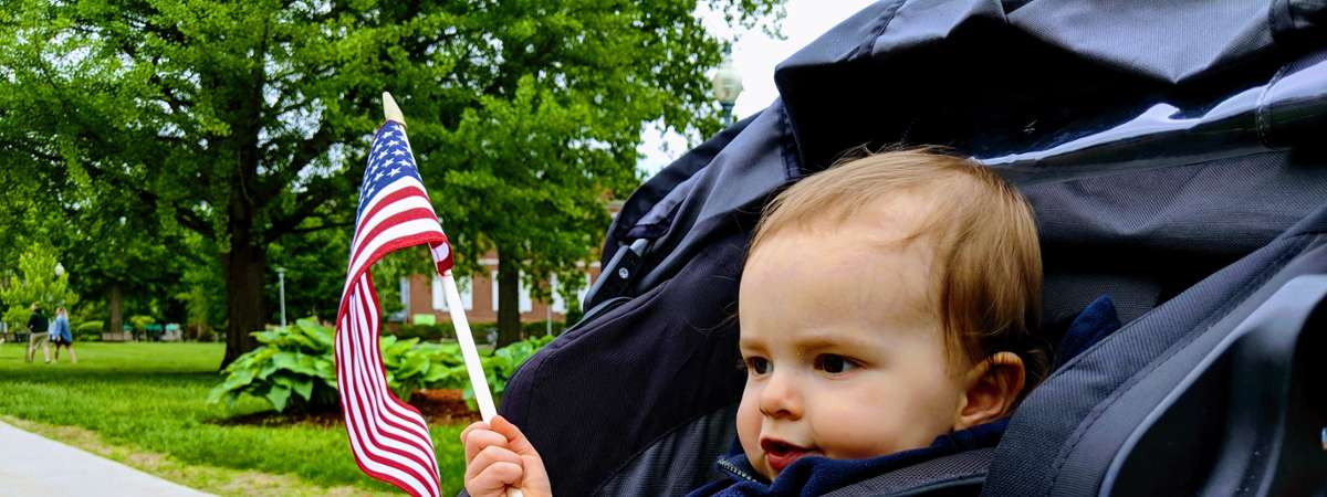 toddler with flag