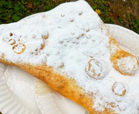 fried dough on a paper plate