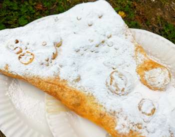fried dough on a paper plate
