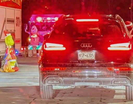 grinch at car at candy cane lane