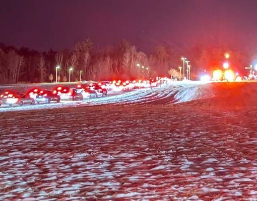 candy cane lane line of cars