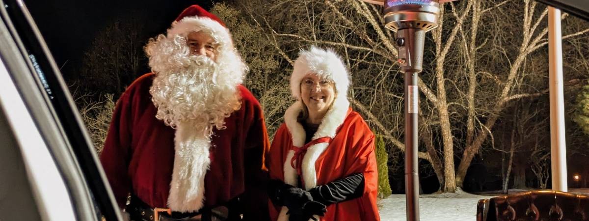 santa and mrs. claus at candy cane lane