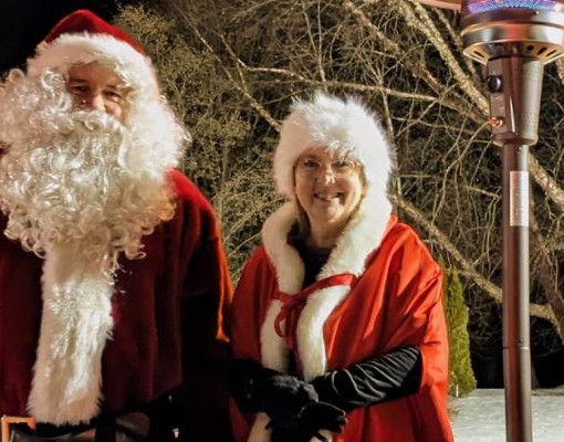 santa and mrs. claus at candy cane lane