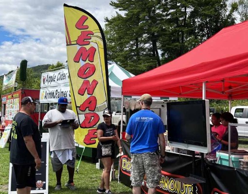 festival goers at lemonade stand