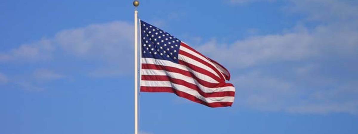 An American flag on a pole