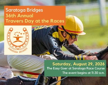 A jockey wearing a yellow hat riding a horse in a race with the Saratoga Bridges logo surrounded by a horseshoe.