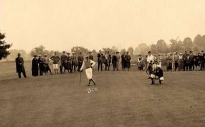 black and white photo of people golfing
