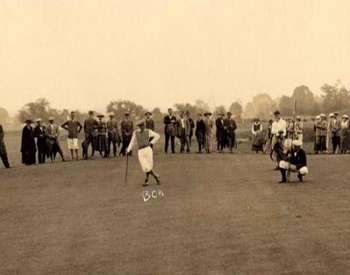 black and white photo of people golfing