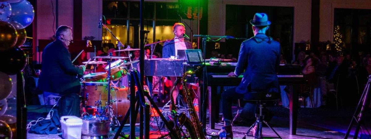 dueling piano performance on a stage