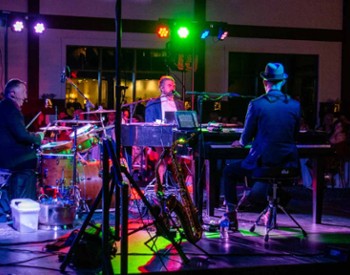 dueling piano performance on a stage