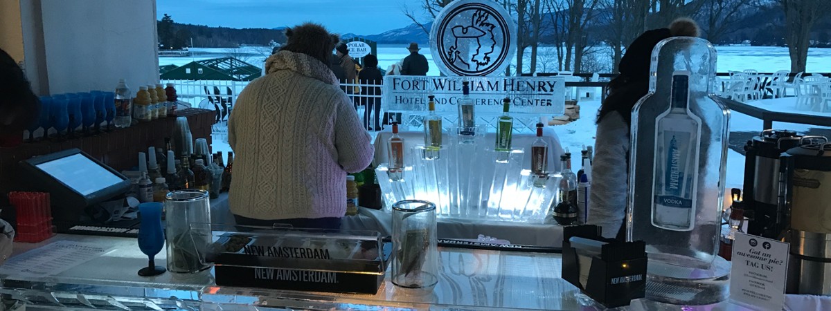 Carved Ice Bar at twilight with lights