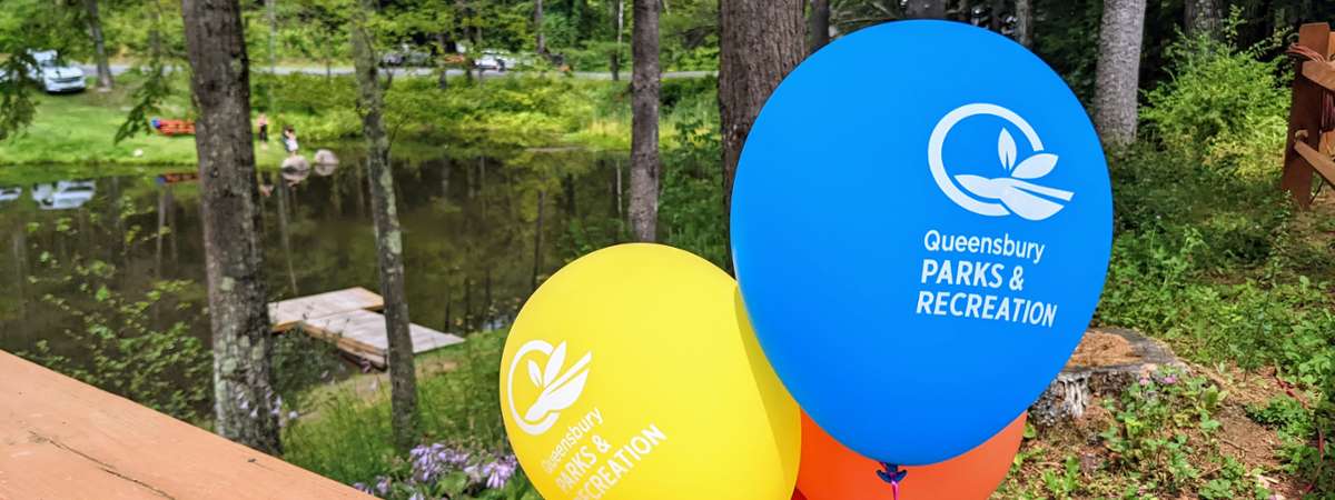 balloons with queensbury parks and rec logo