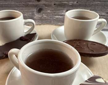 three cups of coffee whith chocolate