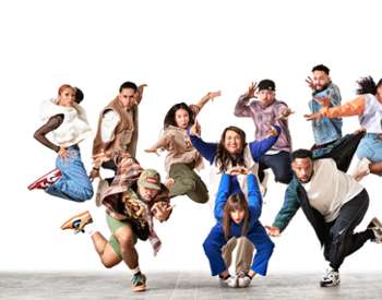 Versa-Style Dance Company jumping in the air
