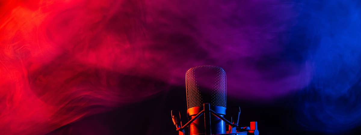 microphone against purplish pink smoky background
