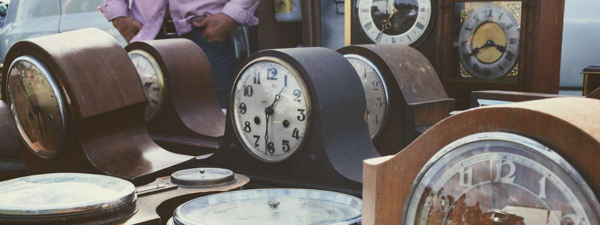 antique clocks on a table