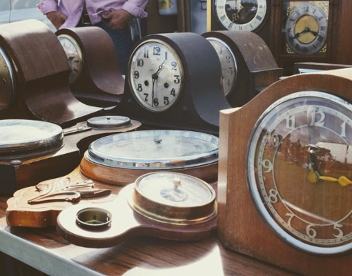 antique clocks on a table