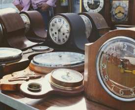 antique clocks on a table