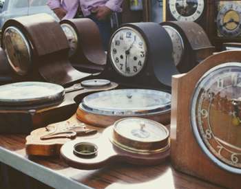 antique clocks on a table