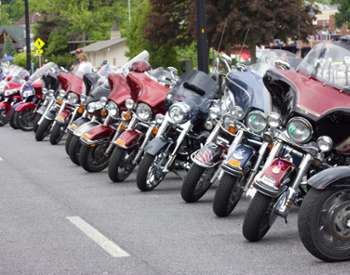 line of motorcycles on road