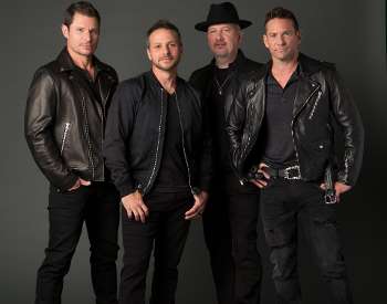 four men posing
