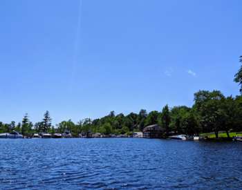 view of boats and shore from lake