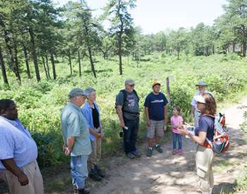 group outdoors on guided nature hike