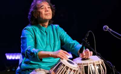 man playing bongos