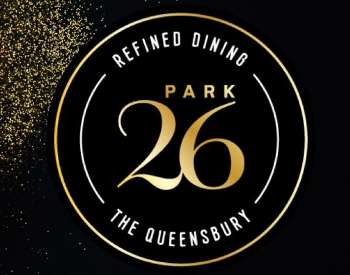 chapmagne cheersing with gold glitter, logo says park 26 refined dining the queensbury