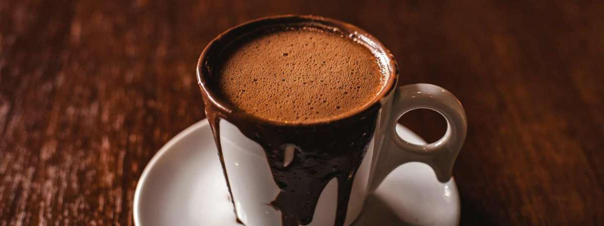 cup of hot chocolate on a saucer