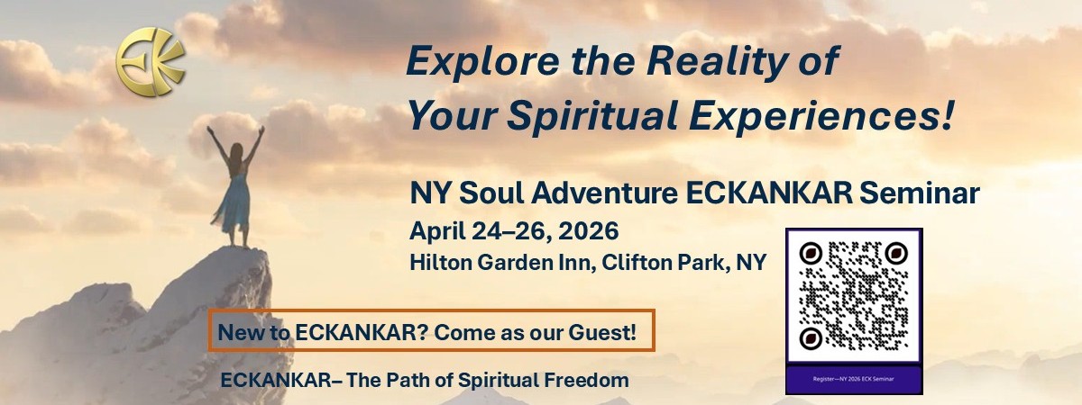 Woman on cliff with arms outstretched with clouds above