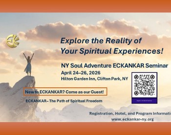 Woman on cliff with arms outstretched with clouds above