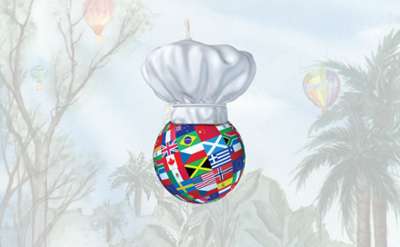 chef hat over globe with world flags