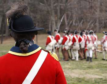 Photo of reenactors of British soldiers during the Revolutionary War