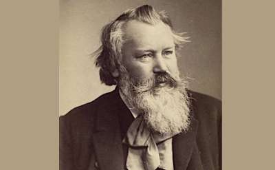 old image of a composer with a beard