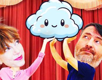 Performers Walt Batycki and Jennifer Lavenhar hold a cartoon cloud
