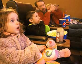 family watches the movies