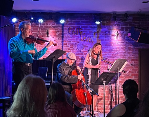 band performing in a small concert venue
