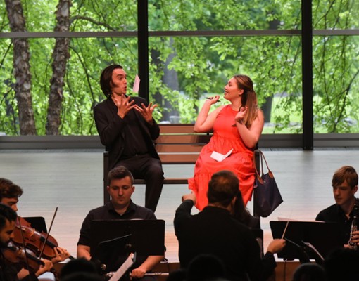 two performers on stage
