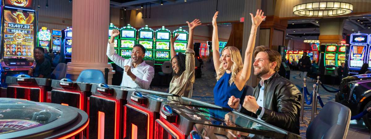 attractive people cheer at casino