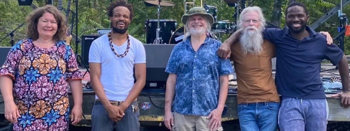 five musicians pose