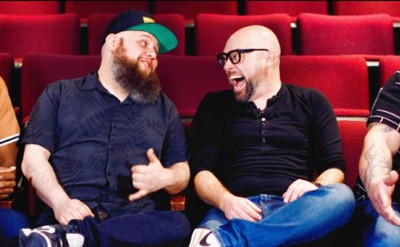 four men in a theater