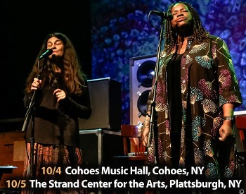 Kat Walkerson of The Garcia Project singing onstage with original Jerry Garcia Band member Jackie Labranch