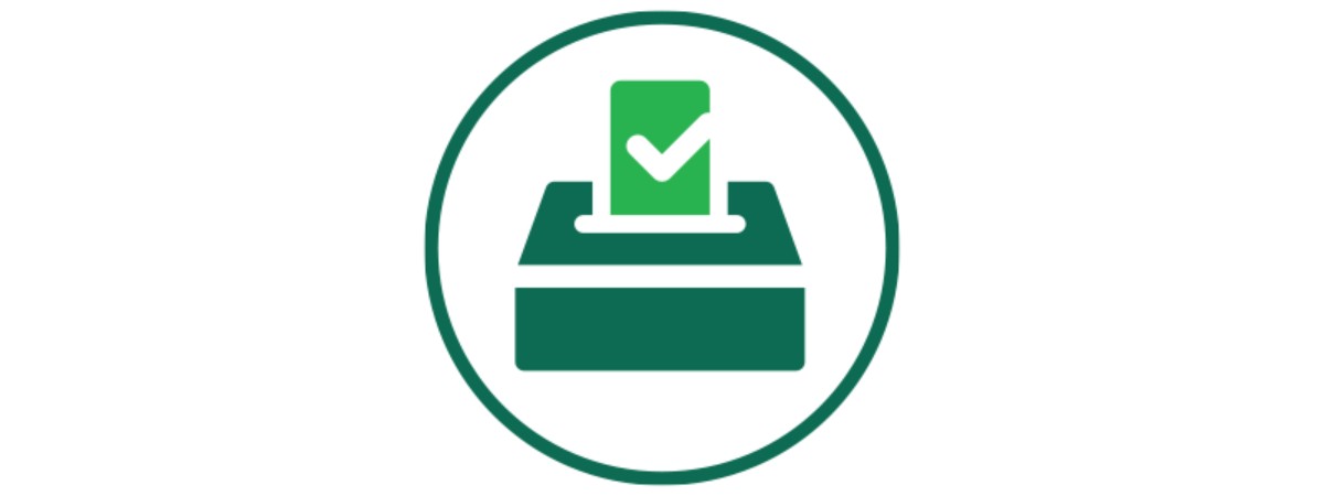 Skidmore Election Icon: Simple representation of a marked ballot entering a ballot box, in green.