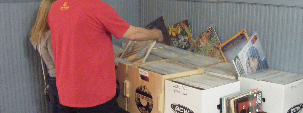 guy browses through records