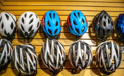 helmets hang on wall