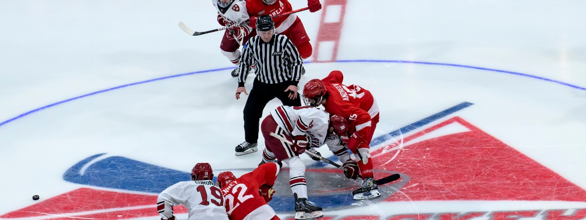 Players battle for the puck during the ECAC tournament.